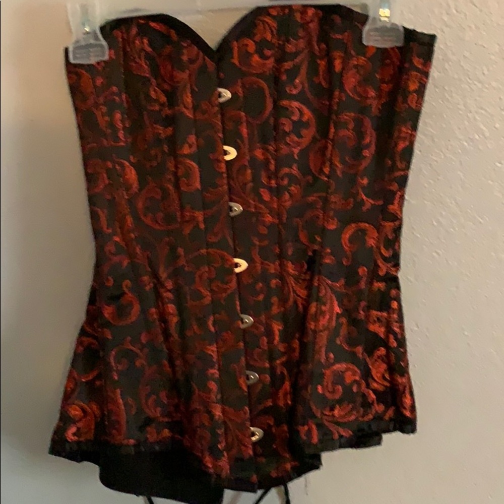Vintage, red and black steel boned corset.